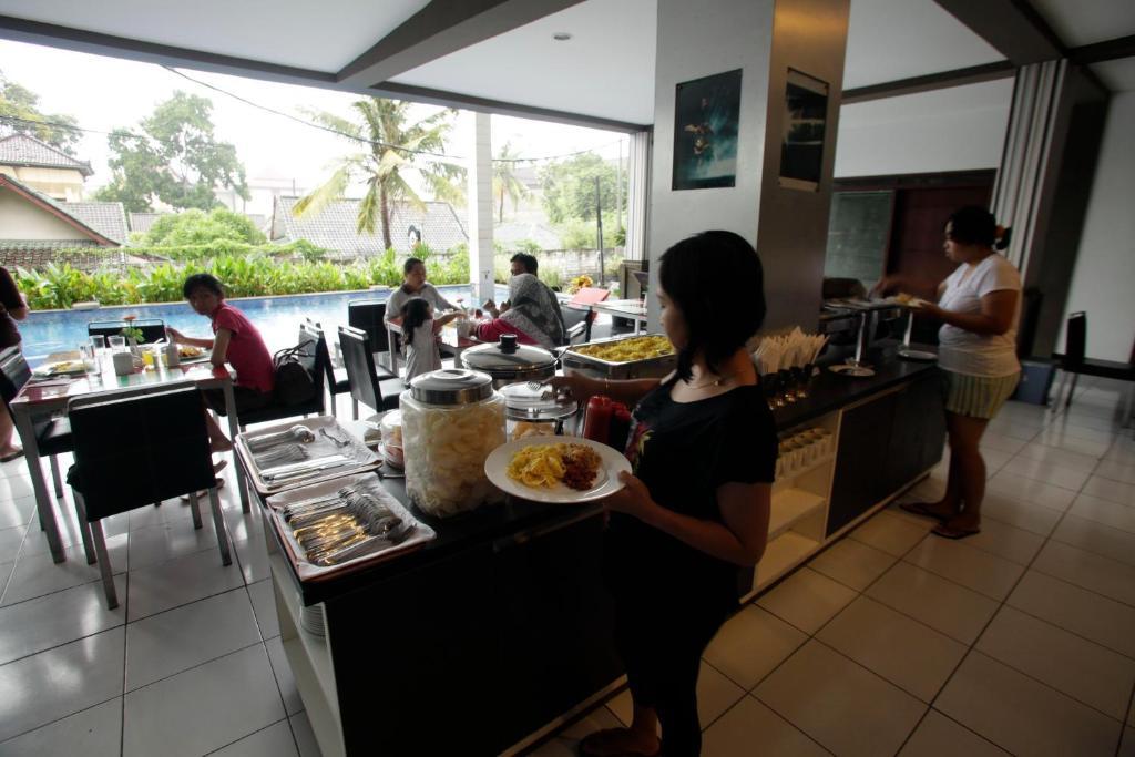 קוטה לומבוק The Harmony Legian Hotel מראה חיצוני תמונה